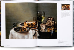 Interior spread featuring food, glassware and a skull on a table — Still Life: Timeless Beauty.